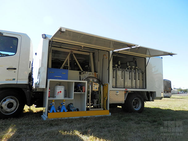 Field Service Vehicle with JAC Hydraulic Lowered Equipment Storage and Bench